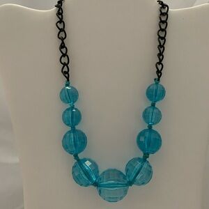 Clear blue beaded fashion necklace.